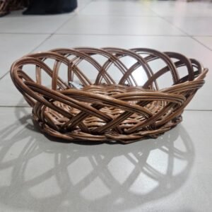 Photo of a natural bamboo fruti holder, showcasing its woven texture and open design, suitable for displaying fruits.